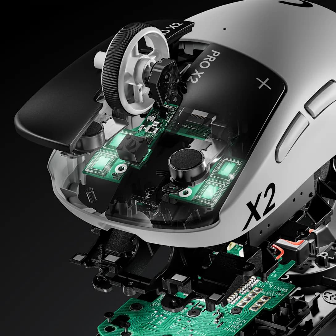 Exploded architecture of the PRO X2, exposing the scroll wheel, circuit boards and internal components